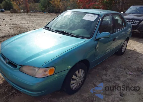 1999 Toyota Corolla Le z USA, uszkodzony, nr VIN 2T1BR12E2XC208457